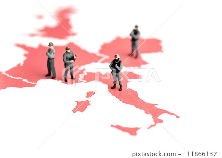 Miniature police on top of map of europe Miniature police on top of map of europe 111866137