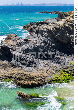 Rocky Atlantic ocean coastline with pure turquoise water 111866480