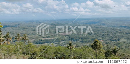 Beautiful view from the top of a high hill 111867452