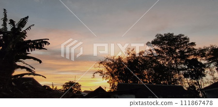 Beautiful twilight and clouds with golden yellow sunlight Beautiful twilight and clouds with golden yellow sunlight 111867478