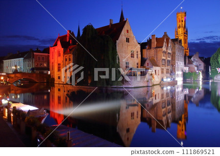 Night view of the cityscape reflected in the canals of the historic center of Bruges (Brugge), a world cultural heritage site in Belgium, Western Europe Night view of the cityscape reflected in the canals of the historic center of Bruges (Brugge), a world cultural heritage site in Belgium, Western Europe 111869521