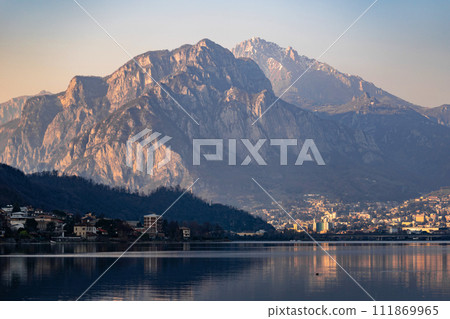 Mountain landscape, picturesque mountain lake in the summer morning, large panorama. Como, Italy Mountain landscape, picturesque mountain lake in the summer morning, large panorama. Como, Italy 111869965