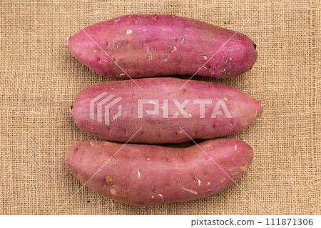 Sweet potato on hemp background Sweet potato on hemp background 111871306
