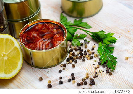 Canned squid in sauce 111872770