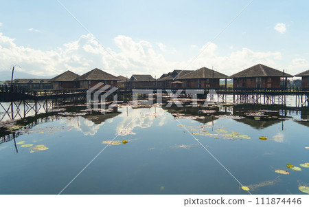 Inle Lake City, The Floating village urban city town houses, lake sea or river. Nature landscape fisheries and fishing tools, Myanmar. Aquaculture farming 111874446