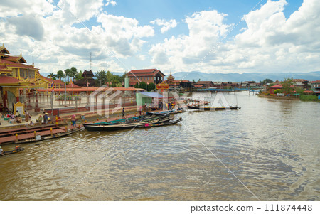 Inle Lake City, The Floating village urban city town houses, lake sea or river. Nature landscape fisheries and fishing tools, Myanmar. Aquaculture farming Inle Lake City, The Floating village urban city town houses, lake sea or river. Nature landscape fisheries and fishing tools, Myanmar. Aquaculture farming 111874448