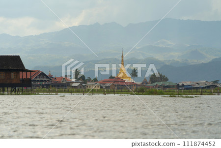 Inle Lake City, The Floating village urban city town houses, lake sea or river. Nature landscape fisheries and fishing tools, Myanmar. Aquaculture farming Inle Lake City, The Floating village urban city town houses, lake sea or river. Nature landscape fisheries and fishing tools, Myanmar. Aquaculture farming 111874452