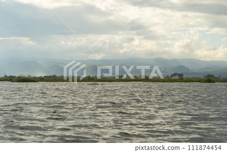 Inle Lake City, The Floating village urban city town houses, lake sea or river. Nature landscape fisheries and fishing tools, Myanmar. Aquaculture farming 111874454