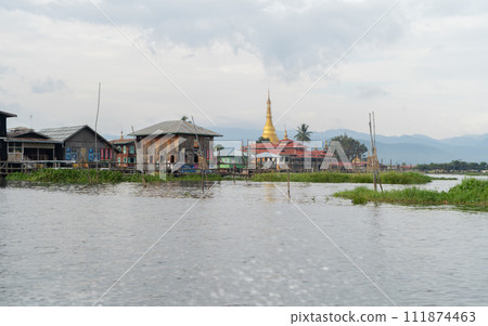 Inle Lake City, The Floating village urban city town houses, lake sea or river. Nature landscape fisheries and fishing tools, Myanmar. Aquaculture farming 111874463