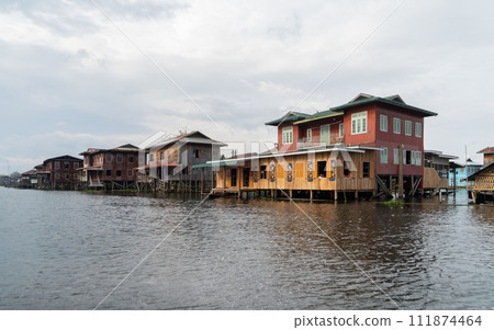 Inle Lake City, The Floating village urban city town houses, lake sea or river. Nature landscape fisheries and fishing tools, Myanmar. Aquaculture farming Inle Lake City, The Floating village urban city town houses, lake sea or river. Nature landscape fisheries and fishing tools, Myanmar. Aquaculture farming 111874464