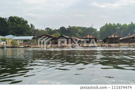 Inle Lake City, The Floating village urban city town houses, lake sea or river. Nature landscape fisheries and fishing tools, Myanmar. Aquaculture farming Inle Lake City, The Floating village urban city town houses, lake sea or river. Nature landscape fisheries and fishing tools, Myanmar. Aquaculture farming 111874474