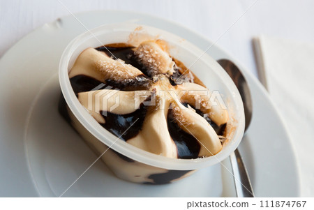 Ice cream with chocolate sauce Ice cream with chocolate sauce 111874767