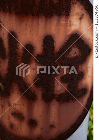 A rusty fire hydrant information board attached to a utility pole A rusty fire hydrant information board attached to a utility pole 111874956