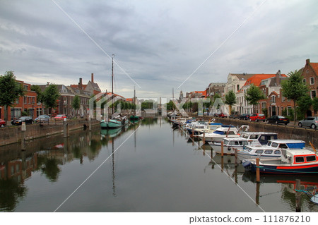 Cityscape along the canal of Rotterdam, the central city of South Holland, the Netherlands in Western Europe 111876210