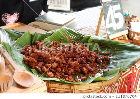 Meat dishes sold at Thai market 111876704