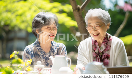 Senior tea party, elderly Japanese woman drinking tea with friends Senior tea party, elderly Japanese woman drinking tea with friends 111876909
