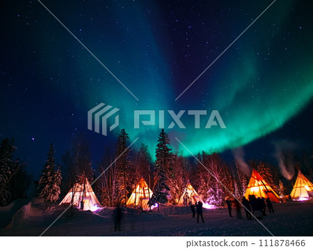 Winter in Canada: A level 4 aurora appears above the home of an indigenous Canadian in Yellowknife. 111878466