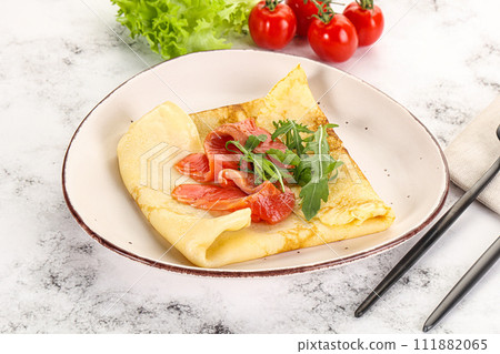 Russian pancake with salmon fish Russian pancake with salmon fish 111882065