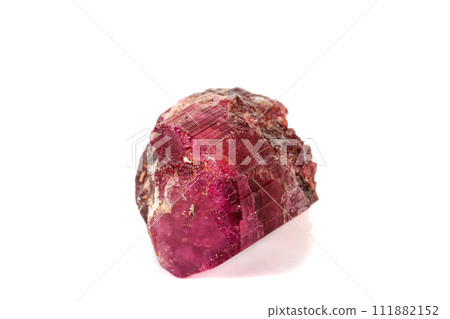 Macro red tourmaline mineral stone on white background Macro red tourmaline mineral stone on white background 111882152