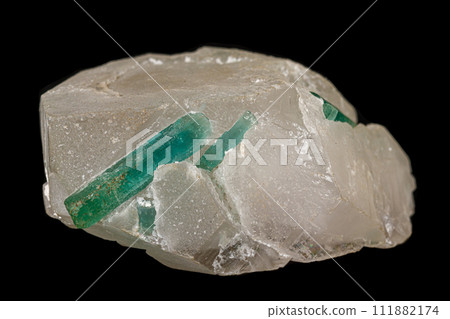 Macro tourmaline mineral stone on black background 111882174