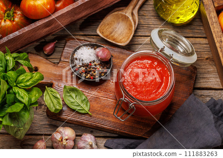 Rich homemade tomato sauce Rich homemade tomato sauce 111883263
