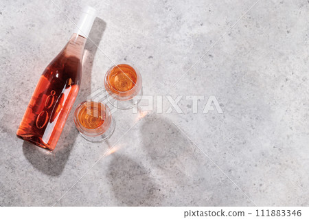 Refreshing rose wine by the pool on a sunny day Refreshing rose wine by the pool on a sunny day 111883346