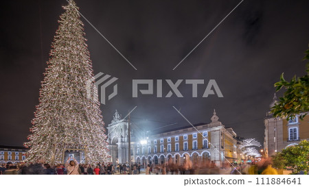 Panorama showing Commerce square illuminated and decorated at Christmas time in Lisbon night timelapse. Portugal 111884641