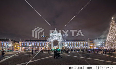 Panorama showing Commerce square illuminated and decorated at Christmas time in Lisbon night timelapse. Portugal 111884642