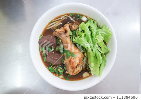 Chinese noodles or chicken noodles 111884696