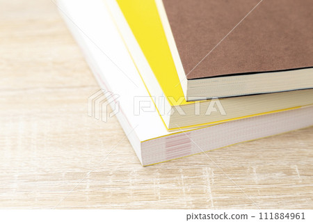 Book placed on the desk 111884961