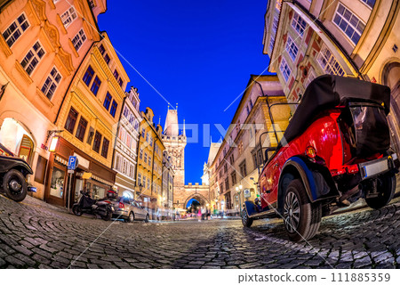 Nighttime at Mostecka street, leading to Prasna brana (Powder Tower) in Prague, Czech Republic Nighttime at Mostecka street, leading to Prasna brana (Powder Tower) in Prague, Czech Republic 111885359