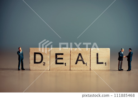 Wooden tiles forming out word DEAL. Business concept Wooden tiles forming out word DEAL. Business concept 111885468