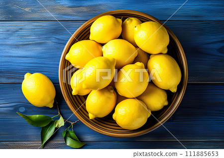 AI-generated content. Short food supply chains SFSCs.From garden to plate concept.A bowl of fresh lemons on the wood table.Flat lay,Copy space 111885653