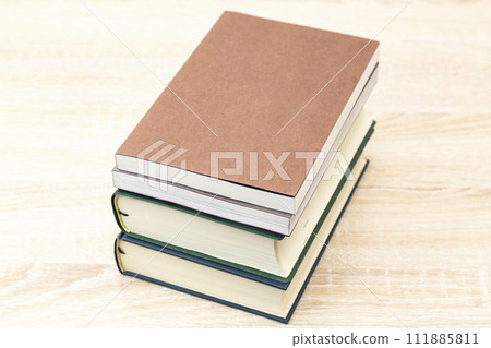 Book placed on the desk 111885811