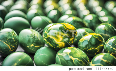 marble shiny green eggs with yellow gold veins, smooth shiny stone texture, top view 111886370
