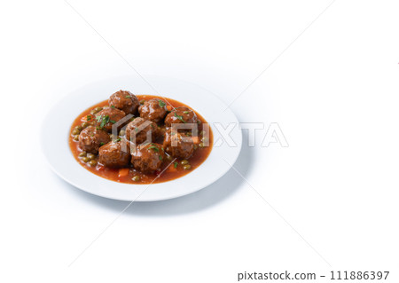 Meatballs, green peas and carrot with tomato sauce isolated on white background 111886397