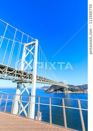 Kanmon Bridge in winter seen from Dannoura PA, Shimonoseki City, Yamaguchi Prefecture 111886730
