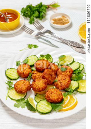 fried rice cutlets, rice tikki on white plate fried rice cutlets, rice tikki on white plate 111886792