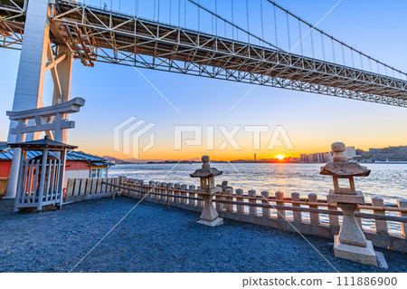 Wabukari Shrine, Kanmon Bridge and sunset in winter, Kitakyushu City, Fukuoka Prefecture 111886900
