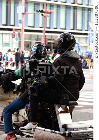 live broadcast camera crew 111887306