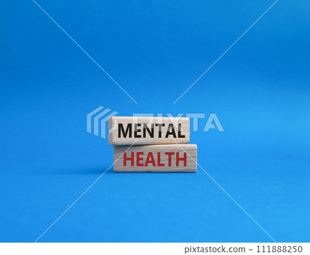 Mental Health symbol. Concept word Mental Health on wooden blocks. Beautiful blue background. Psychology and Mental Health concept. Copy space Mental Health symbol. Concept word Mental Health on wooden blocks. Beautiful blue background. Psychology and Mental Health concept. Copy space 111888250
