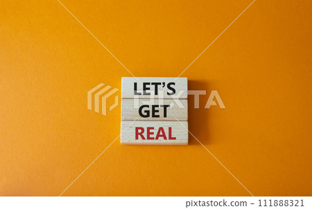 Lets get real symbol. Concept words Lets get real on wooden blocks. Beautiful orange background. Business and Lets get real concept. Copy space. Lets get real symbol. Concept words Lets get real on wooden blocks. Beautiful orange background. Business and Lets get real concept. Copy space. 111888321