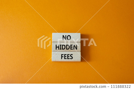 No hidden fees symbol. Concept word No hidden fees on wooden blocks. Beautiful orange background. Business and No hidden fees concept. Copy space No hidden fees symbol. Concept word No hidden fees on wooden blocks. Beautiful orange background. Business and No hidden fees concept. Copy space 111888322