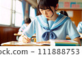 Girl studying in the classroom Female student in a sailor suit studying 111888753
