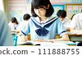 Girl studying in the classroom Female student in a sailor suit studying 111888755