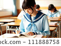 Girl studying in the classroom Female student in a sailor suit studying 111888758