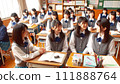 Girls talking in the classroom, students chatting 111888764