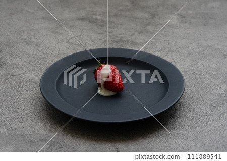 Strawberries with condensed milk Strawberries with condensed milk 111889541