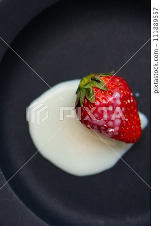 Strawberries with condensed milk Strawberries with condensed milk 111889557