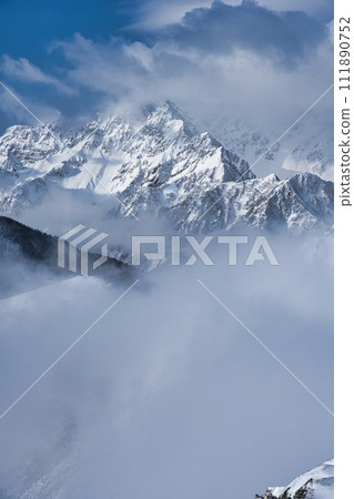 Mountains of the Northern Alps covered in clouds Mountains of the Northern Alps covered in clouds 111890752